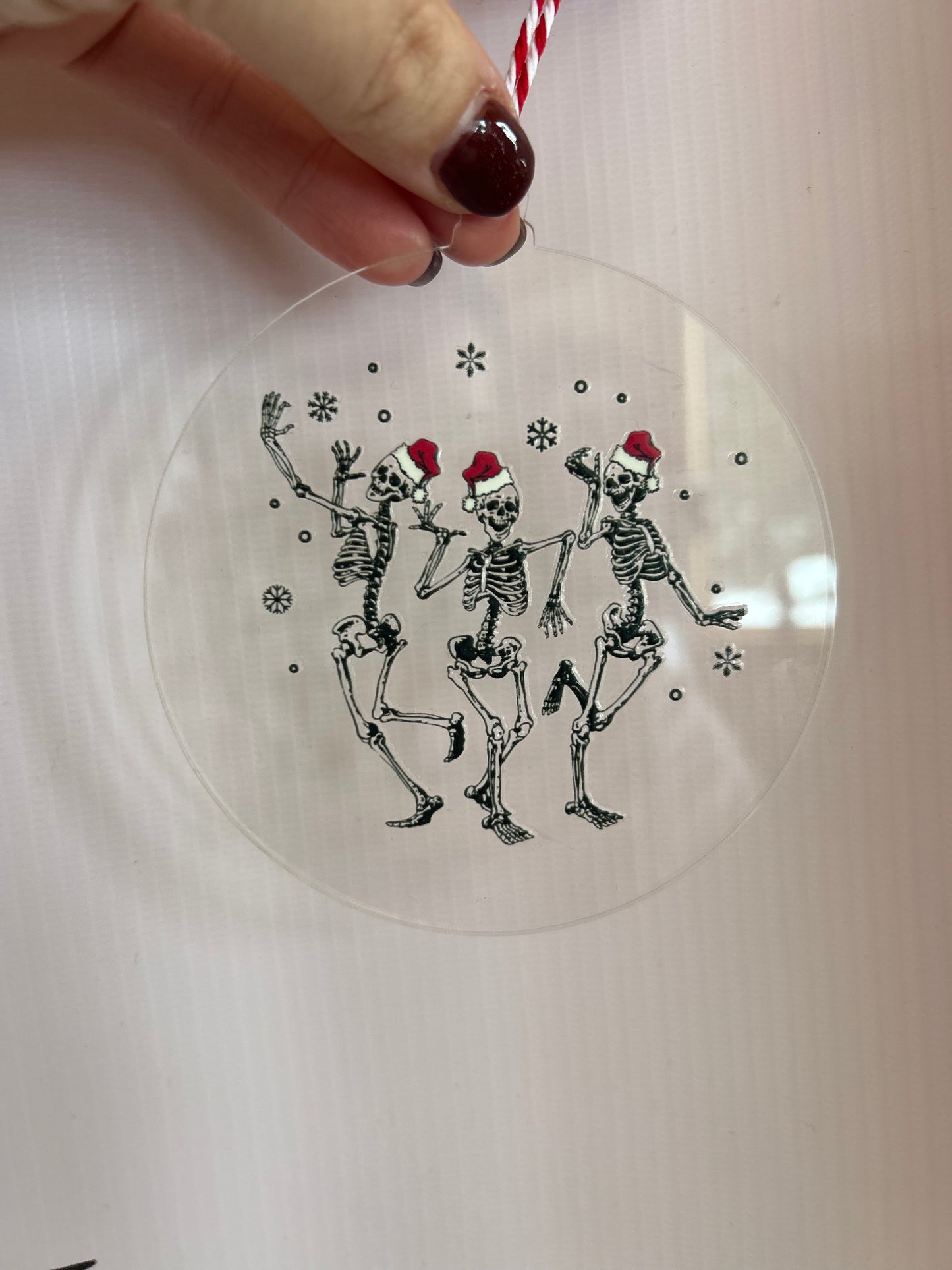 Dancing Skeletons with Santa Hat - Ornament